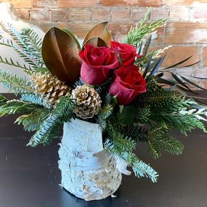 Winter's Embrace: Magnolia and Rose Arrangement